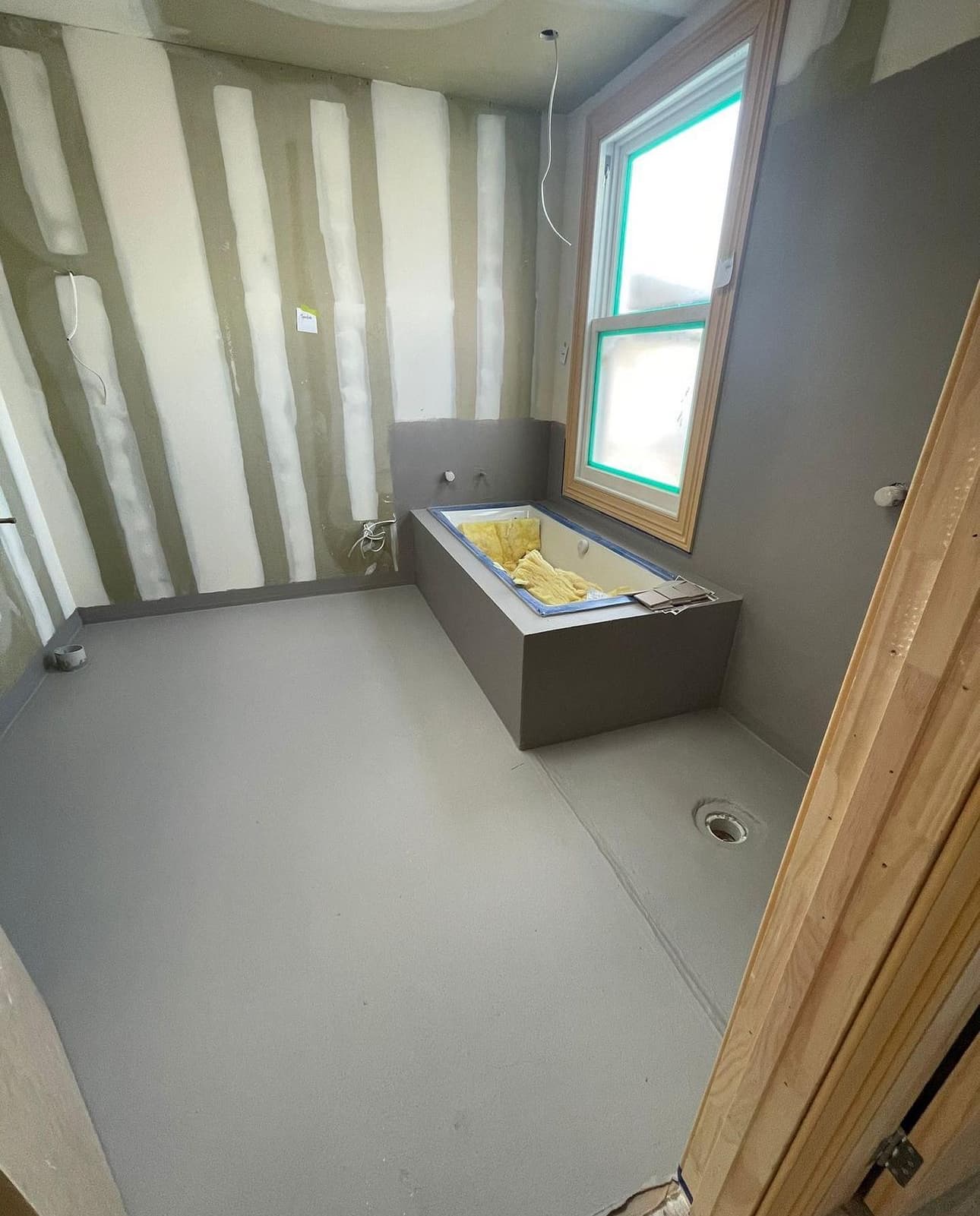 Bathroom waterproofing in progress